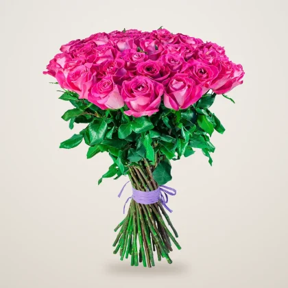 Hand-tied bouquet of hot pink roses with a lilac ribbon