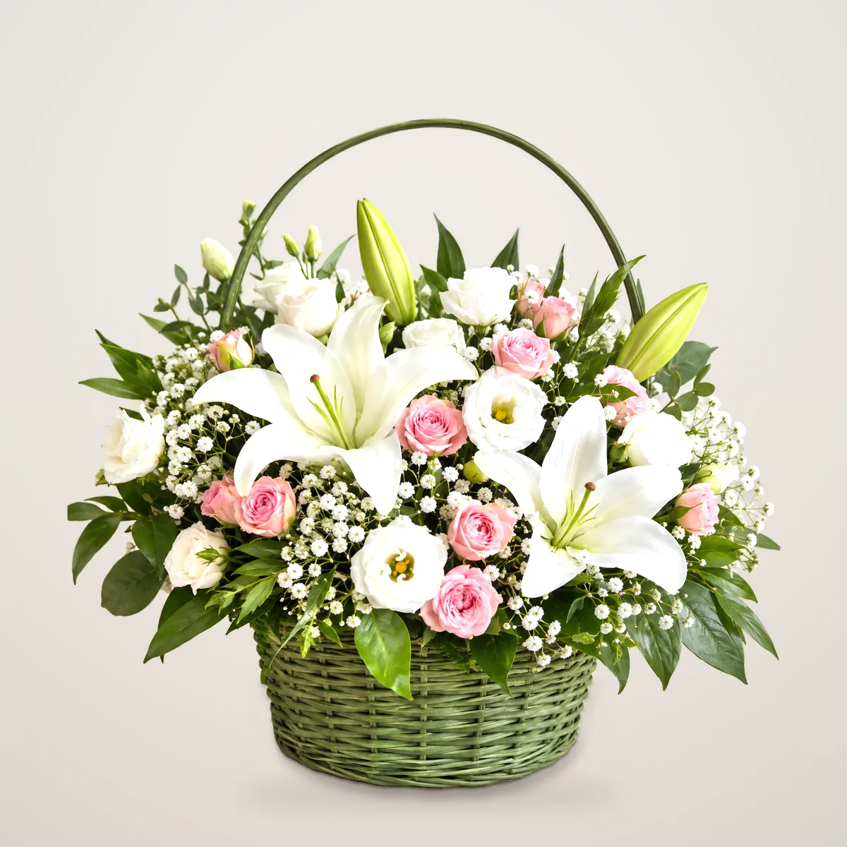 Evergreen Basket - white lilies, lisianthus and pink spray roses in a green basket | 800petals
