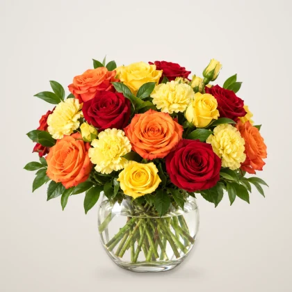 Pumpkin Spice Blooms - red, orange and yellow roses in a glass vase | 800petals