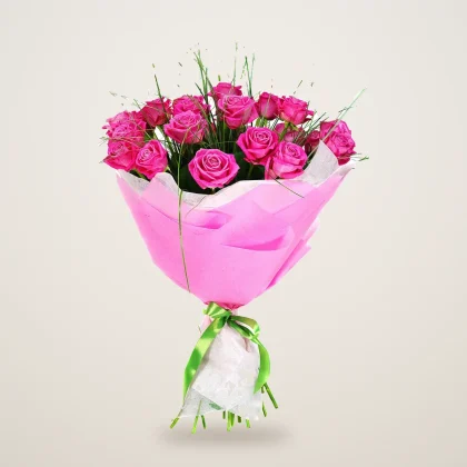 Pink rose bouquet of bright pink roses in pink wrapping paper